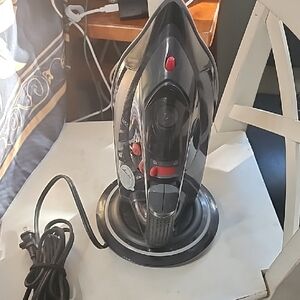 Sleek Black and Red Cordless Steam Iron